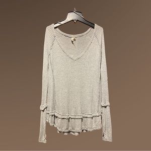 Free People Long sleeve top. Size is Xtra Small, Great Pre-Owned Condition.